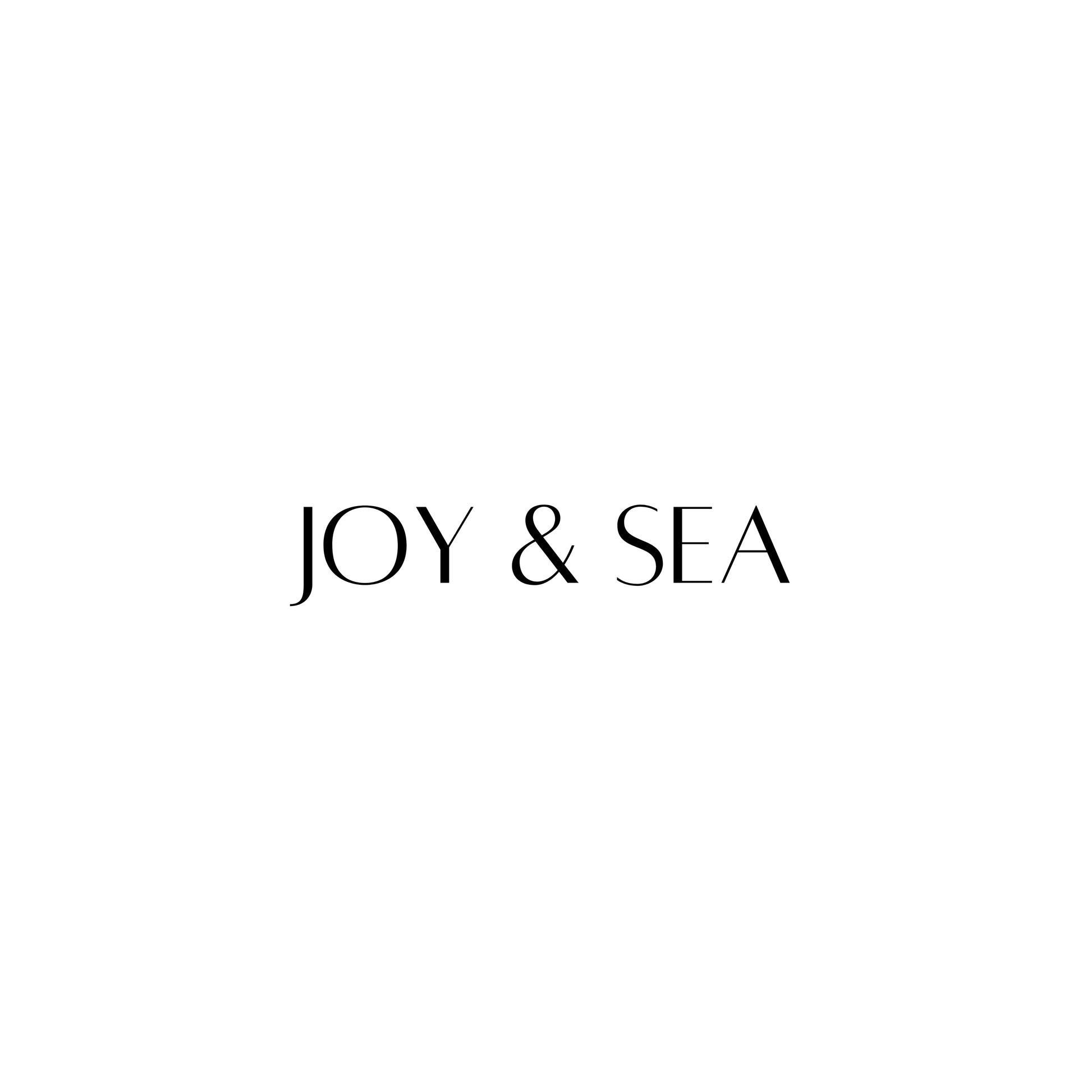 Logo of Joy & Sea, featuring elegant typography on a minimalist background.