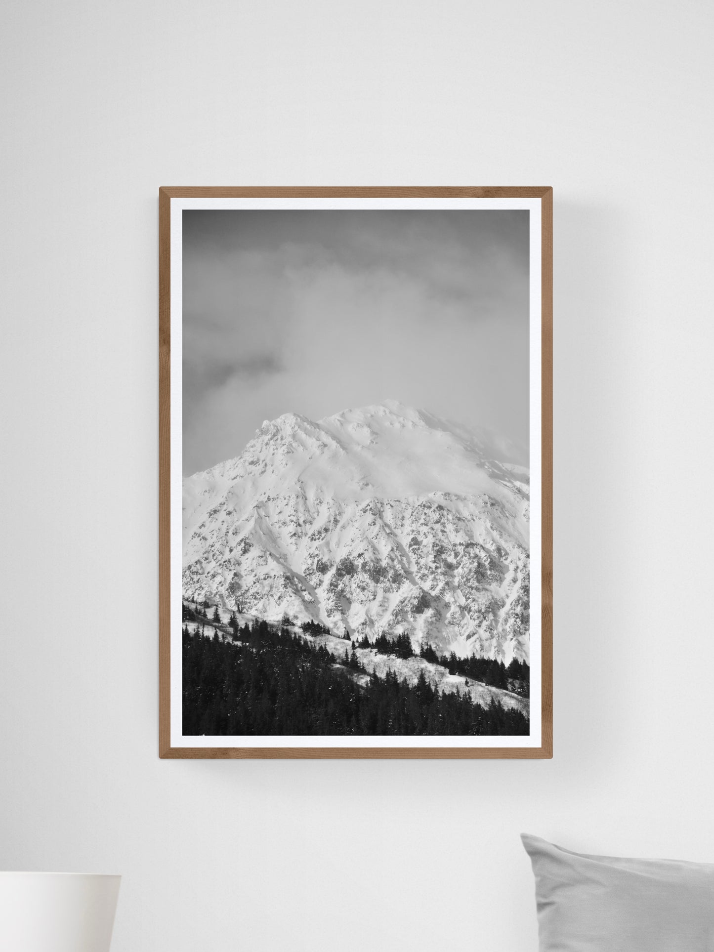 Black and white fine art photography print of a snow-covered mountain in Alaska by Jessica Joy, showcasing winter wonderland.